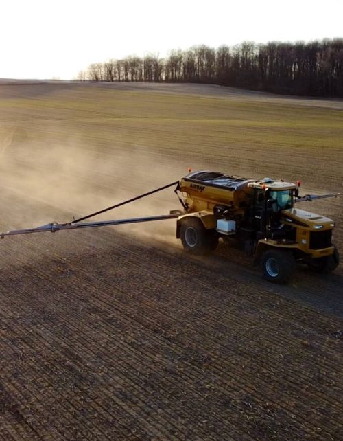 Holmes Agro equipment tending to field